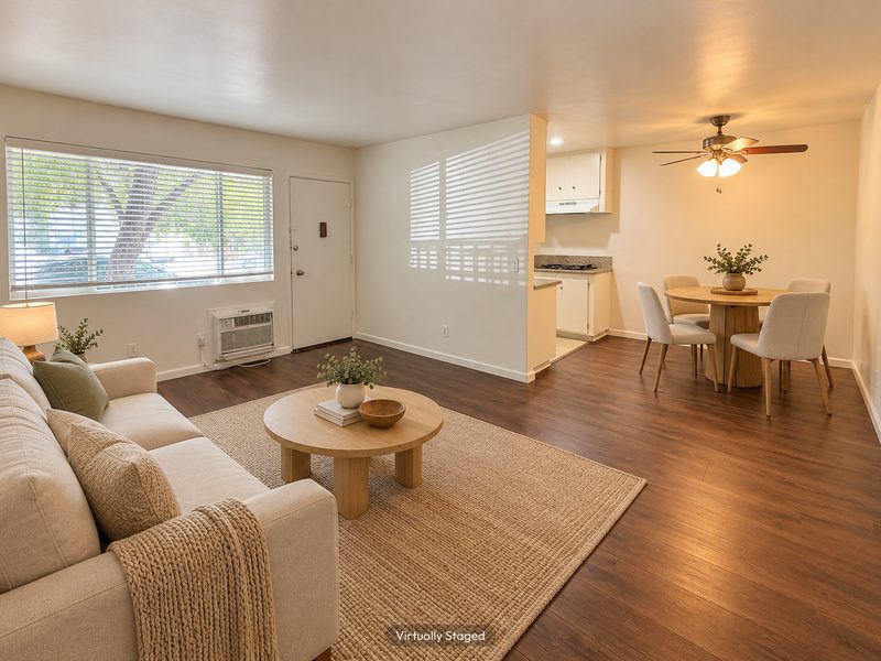 Unit C living and dining room, virtually staged