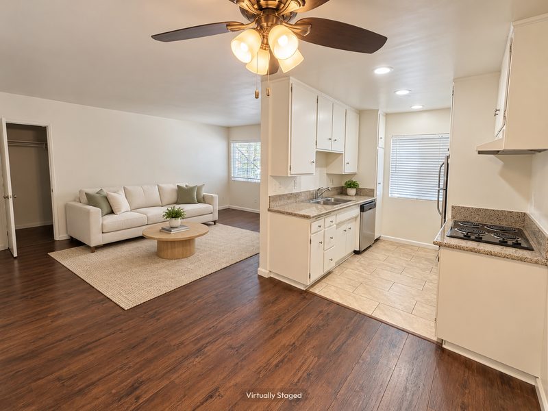 Unit C living room and kitchen, virtually staged
