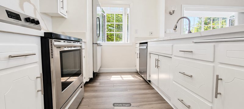 Unit D kitchen, virtually staged