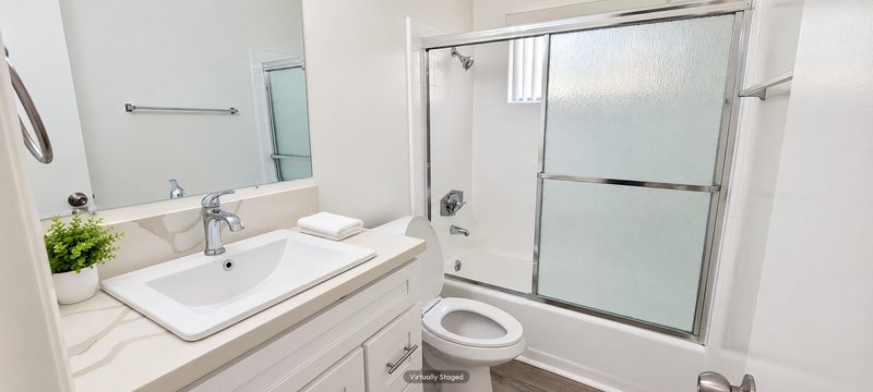 Unit D bathroom, virtually staged