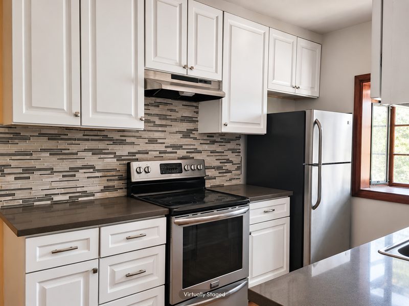 Unit E kitchen, virtually staged