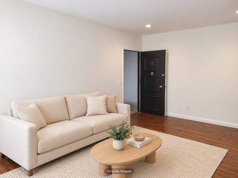 Unit E living room, virtually staged