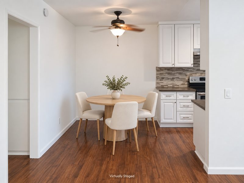 Unit E dining area, virtually staged