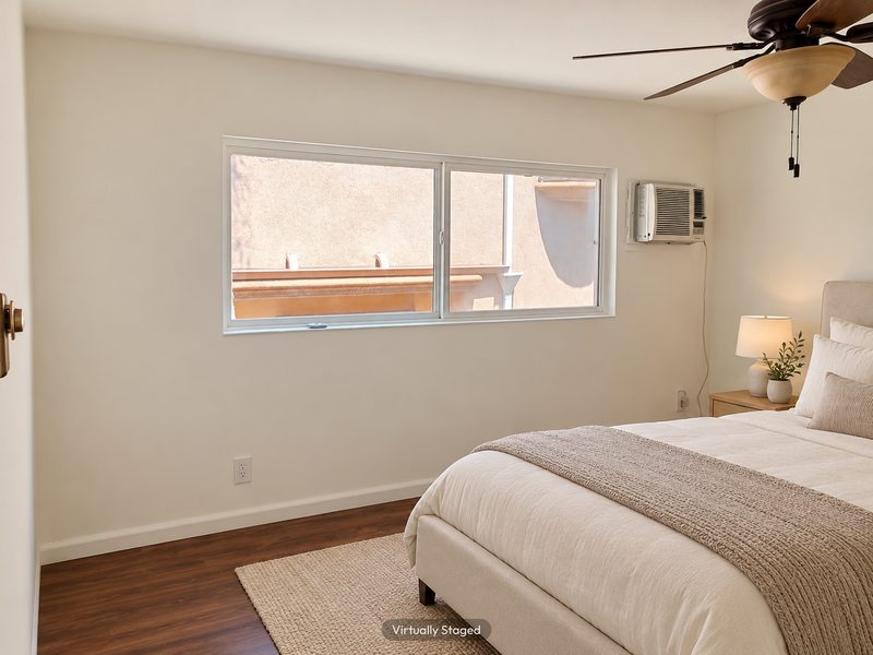 Unit E bedroom, virtually staged