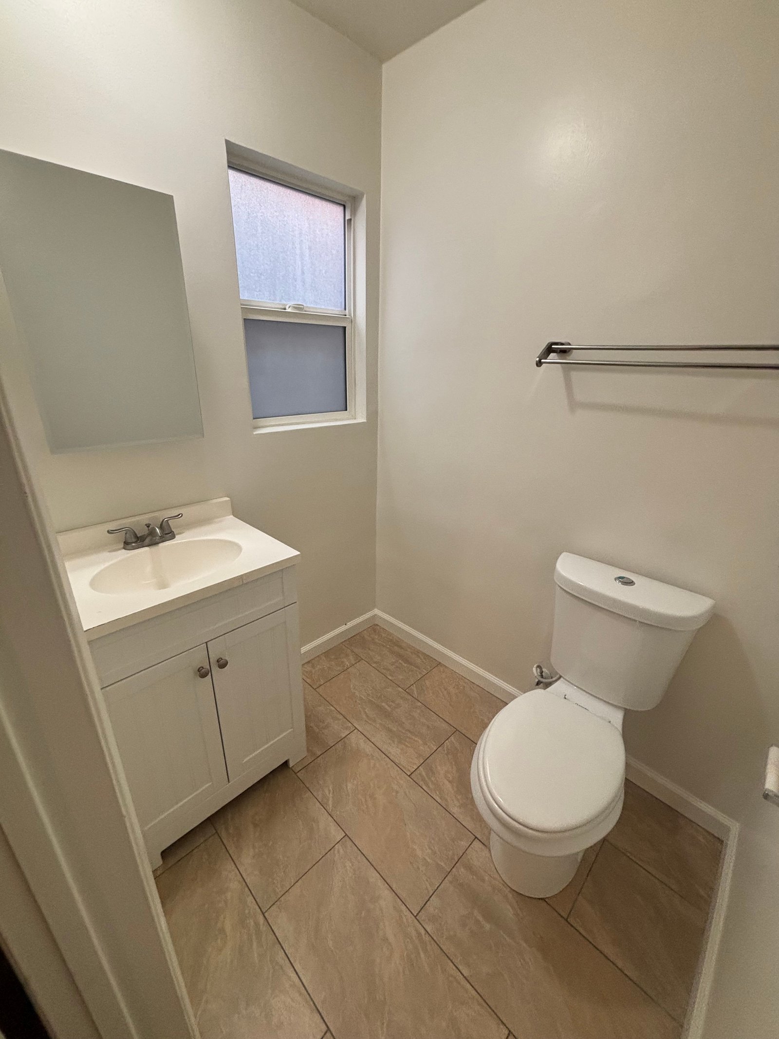 Unit C half bath, original unaltered photo